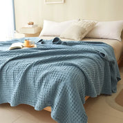 Xinjiang algodão absorvente de umidade e respirável nova classe A algodão oco gaze colcha de verão toalha