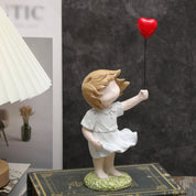Estatueta Menina com Balão