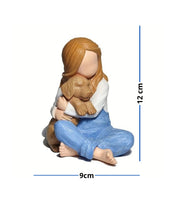 Escultura Menina e Golden Retriever