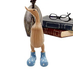 Escultura de Pato em Madeira com Botas de Chuva