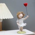 Estatueta Menina com Balão